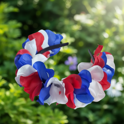 Diadema floral con rosas rojas, blancas y azules