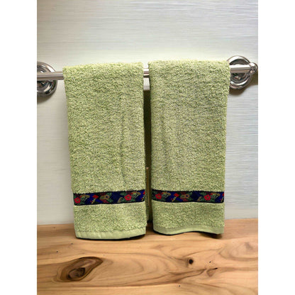 a couple of towels that are on a towel 