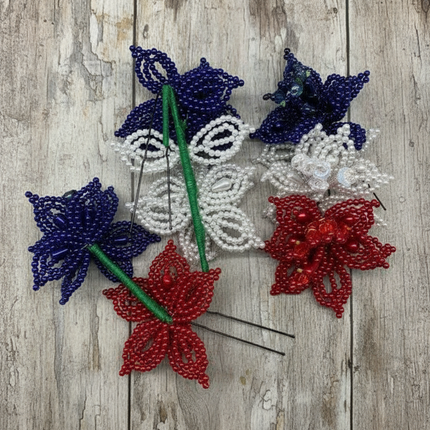Par de horquillas para el pelo con forma de flor de Tapamoños (rojo, blanco y azul)