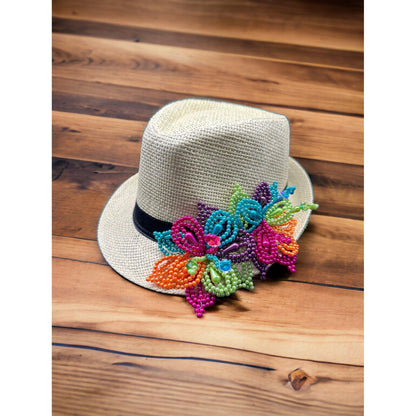 a white hat sitting on a wooden table 