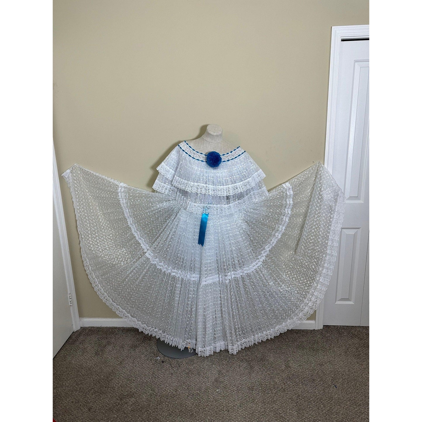 a white umbrella sitting on top of a counter 